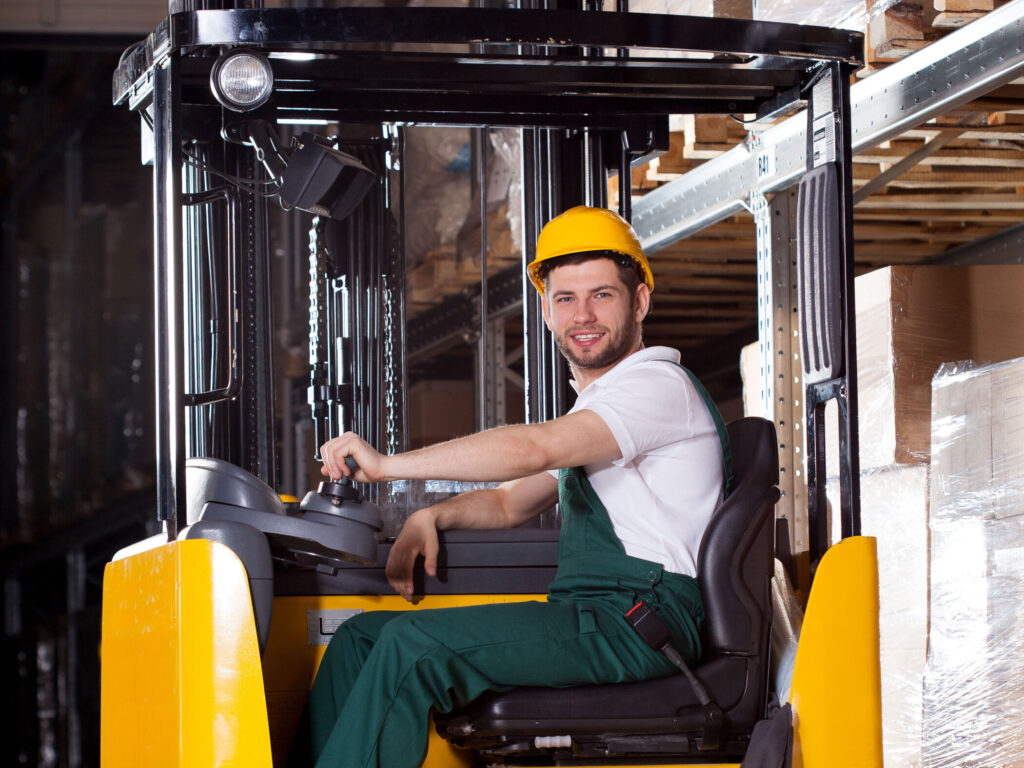 Smiling forklift driver
